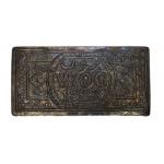 Top view of William Gillespie's metal cigarette case carved with his initials and the year 1923.