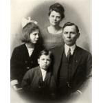 Family portrait of Charles E. Wallen, his wife, daughter, and son.